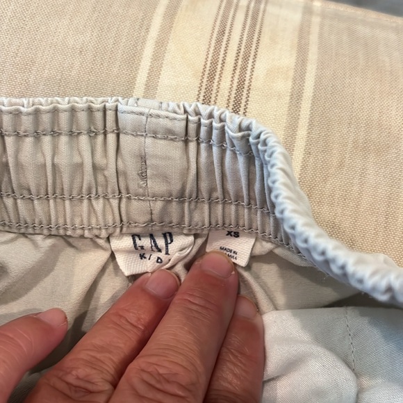 Two pair gap shorts, one khaki one navy size X small - Picture 4 of 7